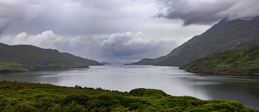 A panoramic view of the Killary Harbour under a cloudy sky at daytime in Ireland