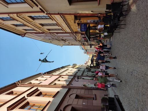 Some people enjoying the local weekend street food market in the city of Lublin, Poland