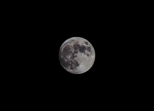 The moon on black sky background
