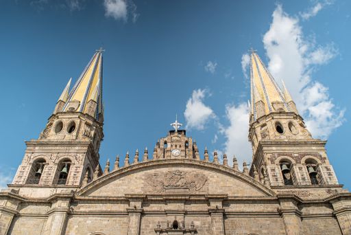 A low angle shot of Guadalajara Cathedral on blue sky background in Mexico