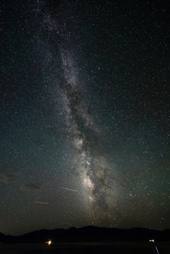 A night sky with stars and the Milky Way in the background