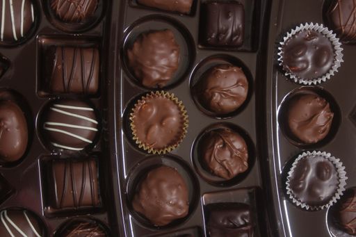 A close-up of chocolates in a variety of flavors