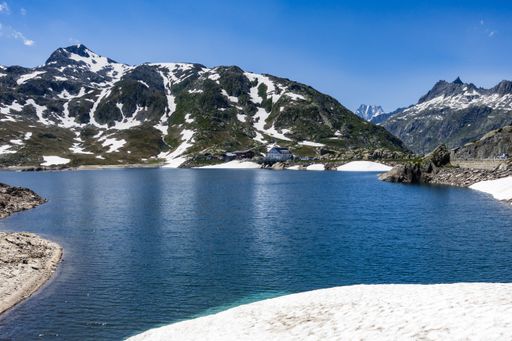 A beautiful shot of blue waters of Totensee lake at Grimsel Pass in Valais, Switzerland
