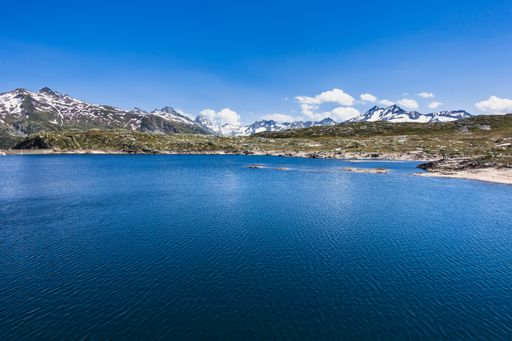 A shot of blue waters of Totensee lake at Grimsel Pass in Valais, Switzerland