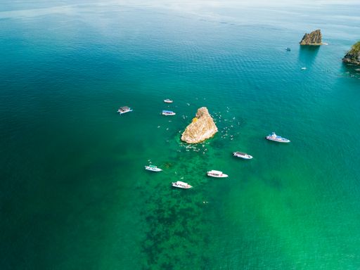 Aerial view of boats sailing on a sunny day near Tortuga Island, Puntarenas, Costa Rica
