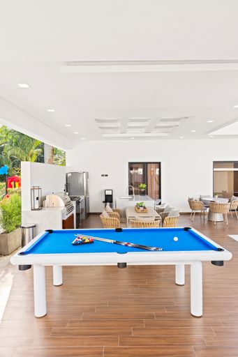 A billiard table in a stylish living room