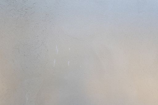 Concrete wall background texture with gray, blue and orange colors. Full frame