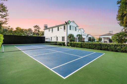 A modern Encino, California new construction home with a tennis court
