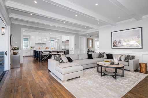 A modern living room with white furniture in new construction home in Encino, California