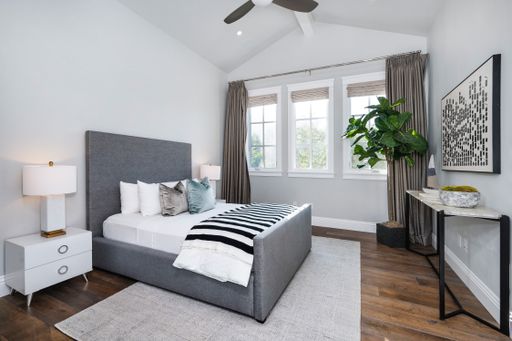 A well-furnished bedroom in a new construction home in Encino, California