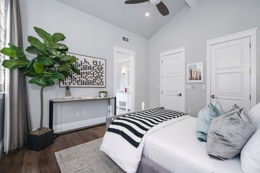 A well-furnished bedroom in a new construction home in Encino, California