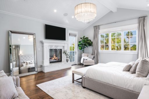 A well-furnished bedroom in a new construction home in Encino, California