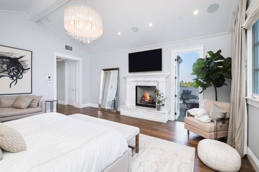 A well-furnished bedroom in a new construction home in Encino, California