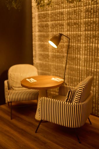 An elegant table and chairs in a stylish room in Madrid, Spain