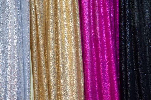 A closeup shot of sparkly colorful fabrics