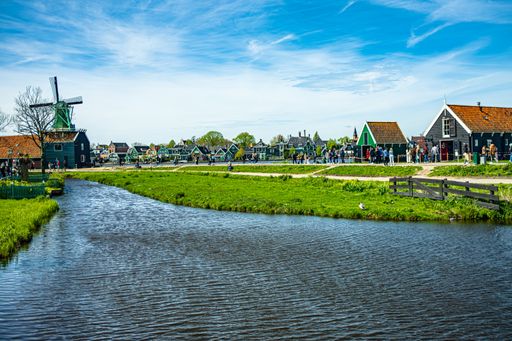 Historic windmills and traditional houses at Zaanse Schans in Zaandam, Netherlands.