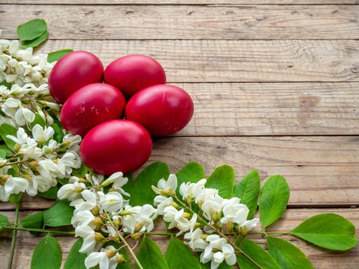 Eggs and white flowers on a table