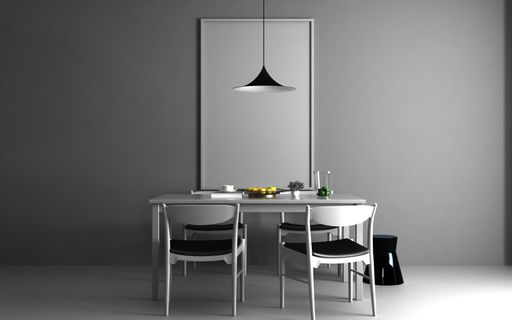 A blank picture frame on the kitchen wall behind the table