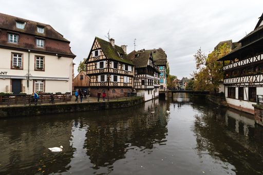 A shot of the traditional, old European houses near the river in Strasbourg. European city concept.