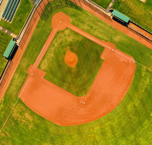 An aerial shot of a baseball field during daytime