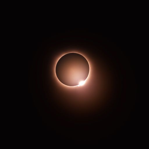 A total solar eclipse against a dark sky