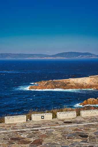 A vertical shot of a beautiful seashore view in Coruna, Galicia, Spain