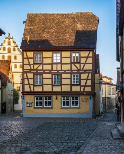 The beautiful colorful buildings in a small cozy town of Rothenburg ob der Tauber in Germany