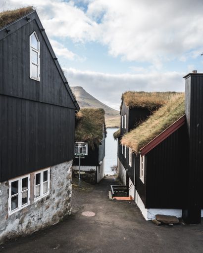 A beautiful photo of rural coastal houses in Faroe Islands