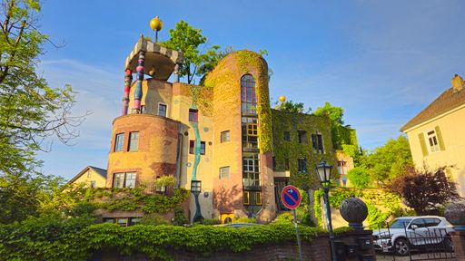 A low angle shot of a beautiful building with a green garden in Bad Soden, Germany