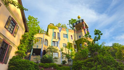 A low angle shot of a beautiful building with a green garden in Bad Soden, Germany