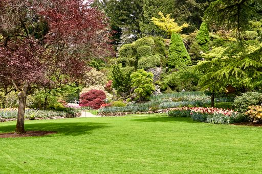 View of the colorful trees and flower beds at the Butchart Gardens, Victoria, BC.
