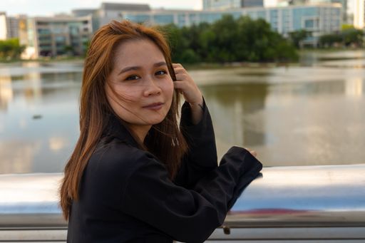 A portrait of a attractive young woman from Vietnam in Starlight bridge, Ho Chi Minh City, Vietnam