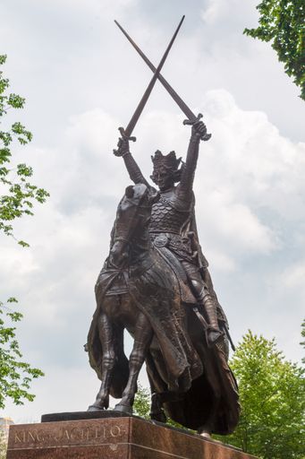 The King Jagiello knight statue standing among trees in Central Park, Manhattan Island, New York City