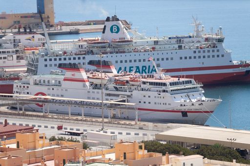 The Port of Almeria, captured with a ship in the foreground through a long-range lens from the Alcazaba in the city of Almeria, Spain. Data 12-9-23