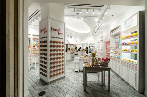A pastry shop with various sweets on the tables and cupboards for sale at a hotel in Las Vegas