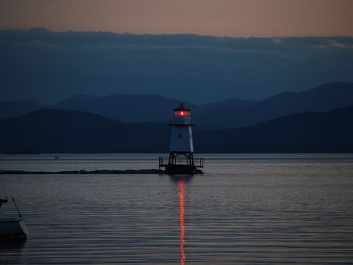 The Burlington Breakwater Lights right after the sun set over the Adirondacks