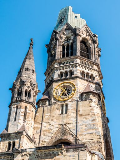 The Kaiser Wilhelm Memorial Church against the blue clear sky