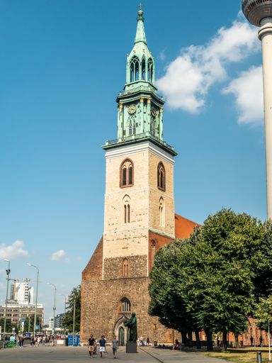 A vertical shot of the external view of St. Mary's church in Berlin, Germany on a sunny day