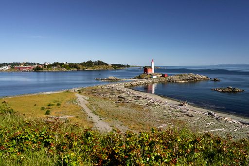 Distant view of Fisgard Lighthouse, Victoria, BC from the ocean beach.