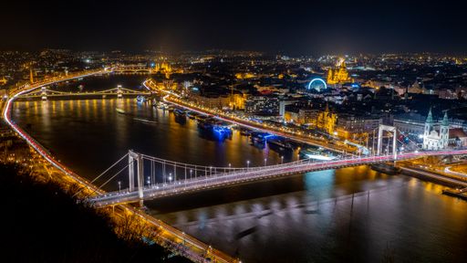 An aerial night view of Budapest cityscape.