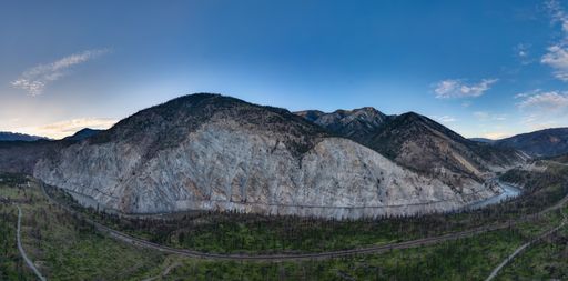 An aerial view of Canadian Mountain Landscape in Valley on a sunny day in BC, Canada