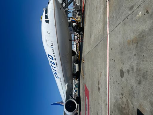 A United Airlines aircraft parked at airport gate
