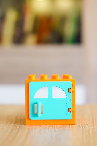 A selective closeup of the Lego Duplo window block on a table
