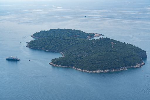 An aerial view of a ship near a Croatian island in Dubrovnik