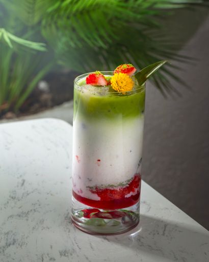 Colorful cocktail with fruit garnish