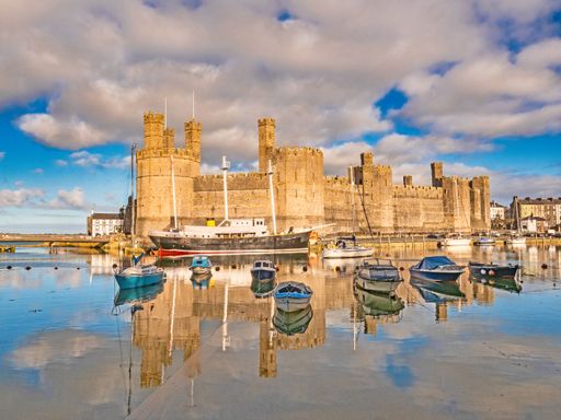 A picturesque sight of Caernarfon Castle in Wales.