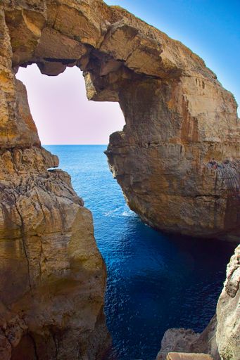 The Wied il-Mielah Window on the north-western coast of the island of Gozo in Malta
