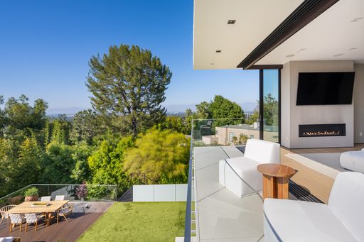 A modern living room with sofa and television