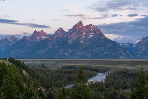 A beautiful shot of mountains and Jenny lake in Grand Teton National Park in Wyoming, USA