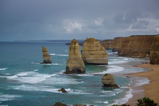 Scenic view of the Twelve Apostles rock formations along the Great Ocean Road in Victoria, Australia on a cloudy day